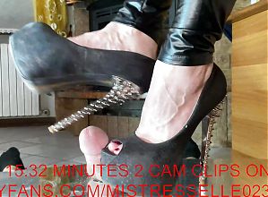 Mistress Elle in spike heels toe destroy her slaves cock